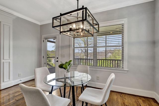 2821 Brentwood Knoll Ct, Nashville, TN 37211 - dining room featuring baseboards, ornamental molding, a chandelier, and wood finished floors