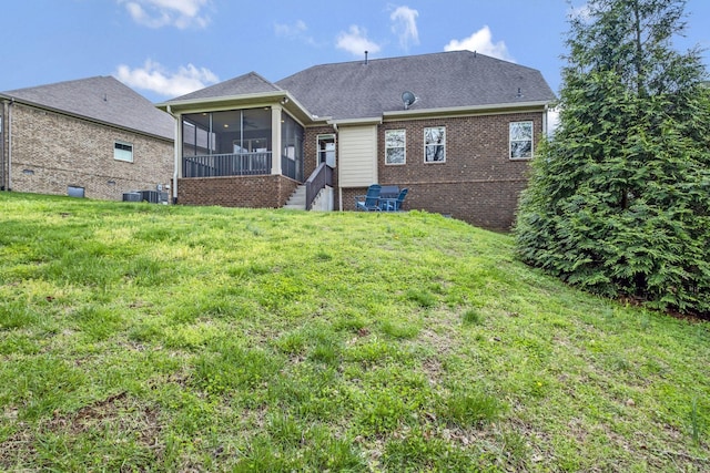 2821 Brentwood Knoll Ct, Nashville, TN 37211 - back of property featuring a sunroom, brick siding, a yard, and cooling unit