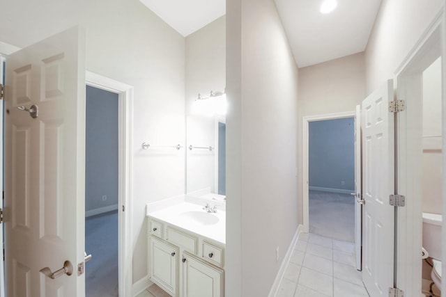 1007 State Blvd, Franklin, TN 37064 - bathroom featuring vanity, toilet, baseboards, and tile patterned flooring