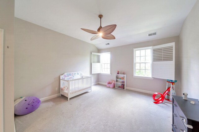 1007 State Blvd, Franklin, TN 37064 - carpeted bedroom with baseboards, a crib, a ceiling fan, and lofted ceiling