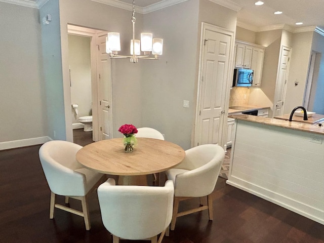 1007 State Blvd, Franklin, TN 37064 - dining space with dark wood-style floors, recessed lighting, ornamental molding, a chandelier, and baseboards