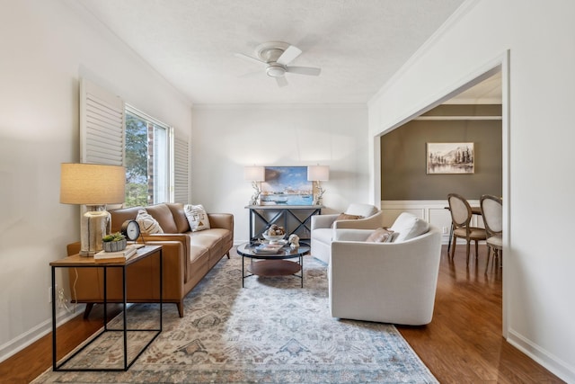 102 Foxborough Sq W, Brentwood, TN 37027 - living area featuring wood finished floors, crown molding, baseboards, and ceiling fan