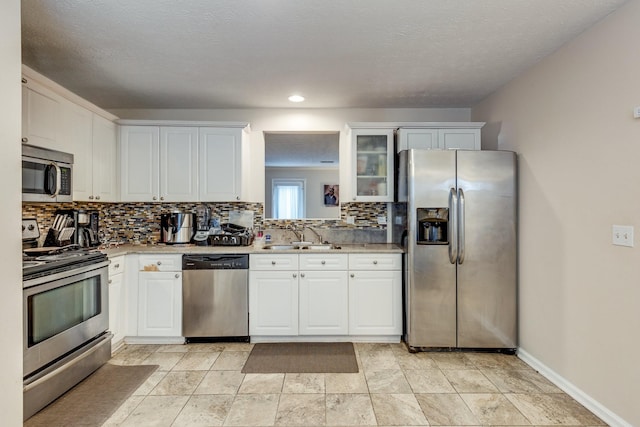 2962 Baby Ruth Ln Unit 8, Antioch, TN 37013 - kitchen with white cabinets, stainless steel appliances, and light countertops