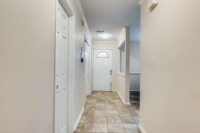 2962 Baby Ruth Ln Unit 8, Antioch, TN 37013 - entryway with crown molding, baseboards, and a textured ceiling