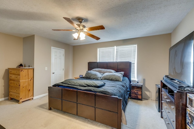2962 Baby Ruth Ln Unit 8, Antioch, TN 37013 - bedroom featuring baseboards, light carpet, a textured ceiling, and a ceiling fan