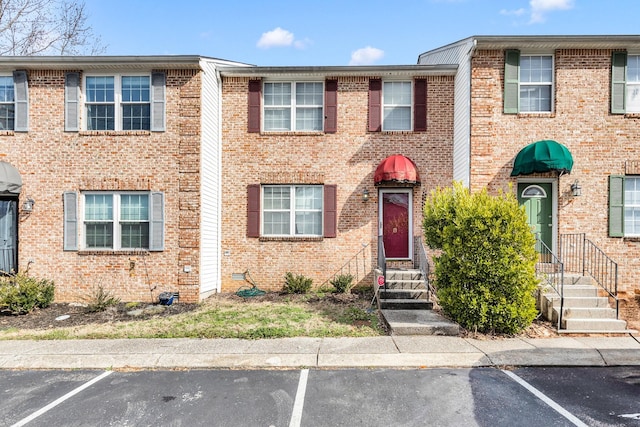 2962 Baby Ruth Ln Unit 8, Antioch, TN 37013 - view of property featuring uncovered parking and brick siding
