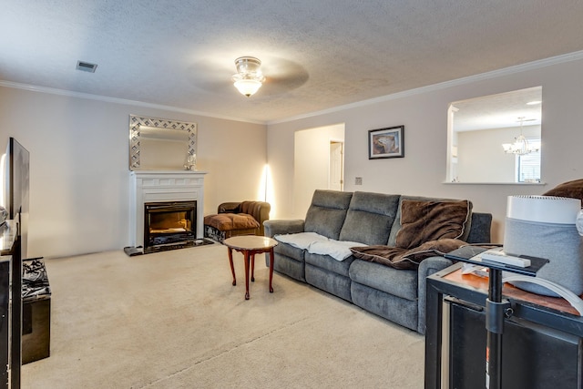 2962 Baby Ruth Ln Unit 8, Antioch, TN 37013 - carpeted living area featuring a glass covered fireplace, a notable chandelier, visible vents, and a textured ceiling