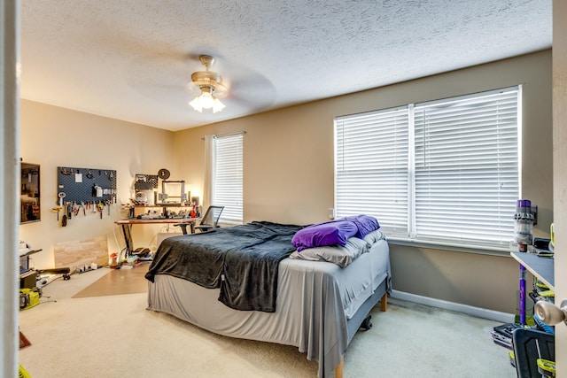 2962 Baby Ruth Ln Unit 8, Antioch, TN 37013 - carpeted bedroom with baseboards, a textured ceiling, and ceiling fan