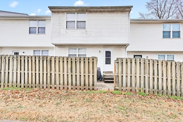 2962 Baby Ruth Ln Unit 8, Antioch, TN 37013 - rear view of property with entry steps and a fenced backyard