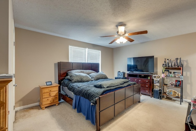 2962 Baby Ruth Ln Unit 8, Antioch, TN 37013 - bedroom featuring baseboards, light colored carpet, a textured ceiling, and a ceiling fan