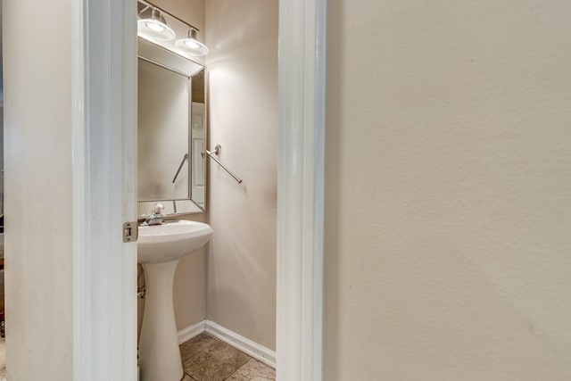 2962 Baby Ruth Ln Unit 8, Antioch, TN 37013 - bathroom featuring a sink and baseboards