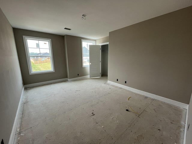 176 Cardinal Crk, Clarksville, TN 37040 - unfurnished bedroom featuring baseboards and a closet