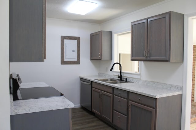 kitchen featuring a sink, stainless steel dishwasher, dark wood finished floors, light countertops, and stove