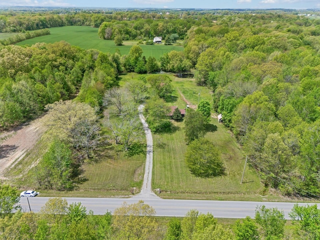 bird's eye view featuring a forest view
