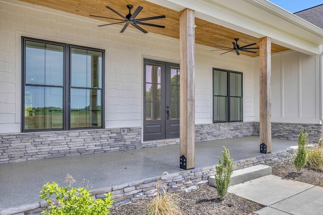 184 Emma Ln, Hohenwald, TN 38462 - property entrance with french doors, stone siding, and a ceiling fan
