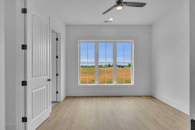 184 Emma Ln, Hohenwald, TN 38462 - unfurnished bedroom with visible vents, baseboards, and light wood finished floors