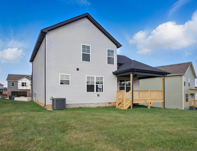 151 Cardinal Crk, Clarksville, TN 37040 - rear view of house featuring central AC, a yard, a ceiling fan, and a deck