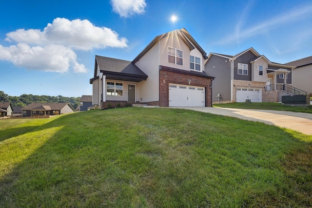 151 Cardinal Crk, Clarksville, TN 37040 - view of front of house with an attached garage, driveway, brick siding, and a front yard