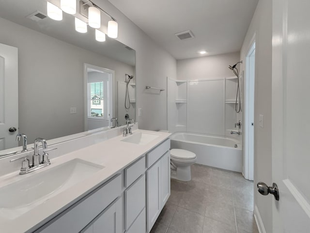 full bathroom featuring tile patterned flooring, visible vents, and a sink