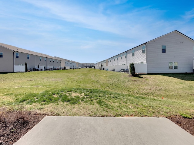 view of yard featuring a residential view