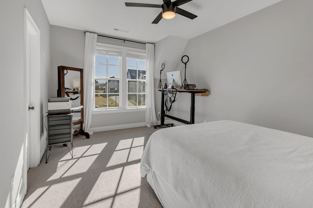 bedroom with baseboards, visible vents, ceiling fan, and carpet floors
