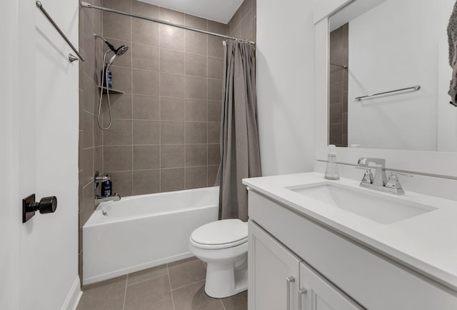 full bath featuring tile patterned floors, vanity, toilet, and shower / bath combination with curtain