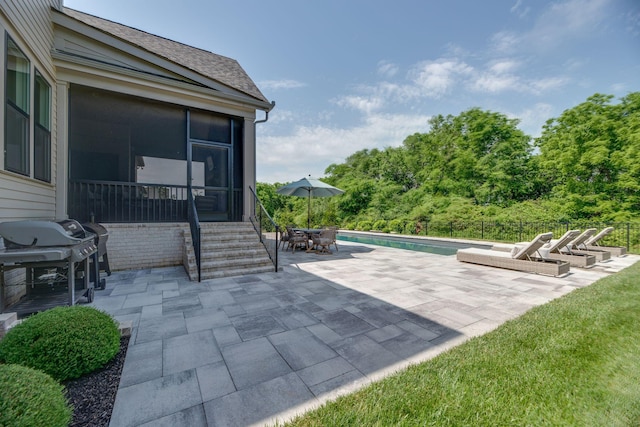 6337 Percheron Ln, Arrington, TN 37014 - view of patio with a sunroom, area for grilling, and outdoor dining space