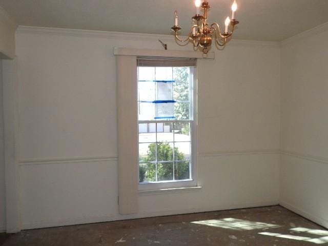 203 Valleydale St, Smyrna, TN 37167 - unfurnished room featuring an inviting chandelier, plenty of natural light, and ornamental molding