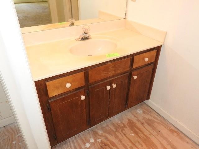 203 Valleydale St, Smyrna, TN 37167 - bathroom featuring baseboards, wood finished floors, and vanity