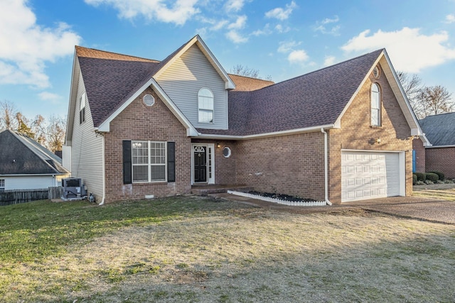 traditional-style home featuring a front lawn, driveway, brick siding, and roof with shingles
