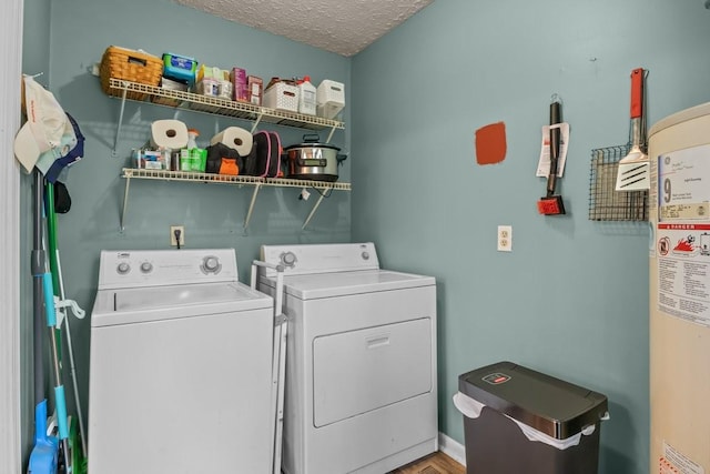 109 Robin Hood Rd, Dickson, TN 37055 - washroom with washing machine and dryer, laundry area, and a textured ceiling