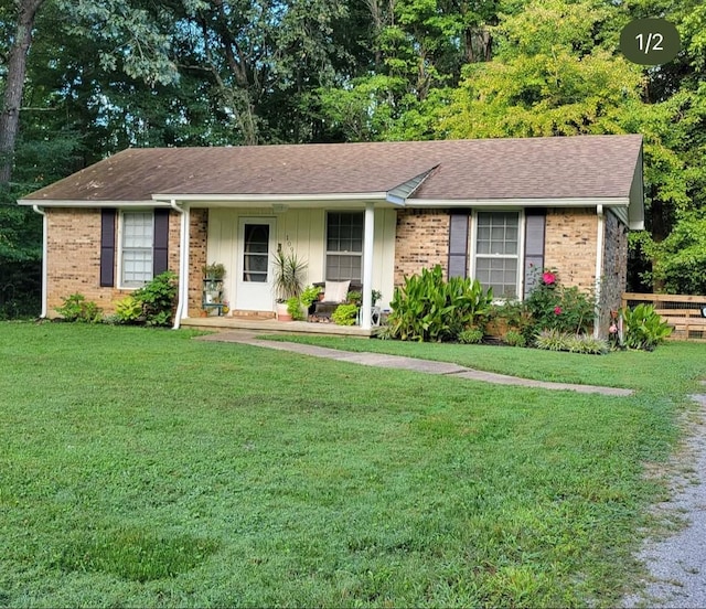 109 Robin Hood Rd, Dickson, TN 37055 - single story home featuring brick siding and a front lawn