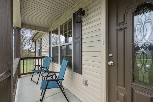 balcony featuring a porch