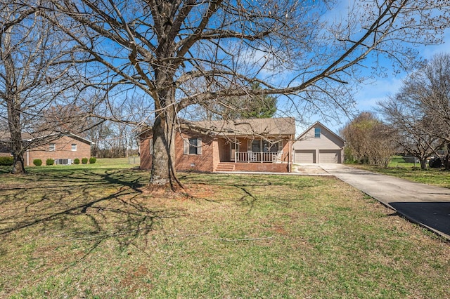 ranch-style house with brick siding, a front lawn, concrete driveway, covered porch, and a garage