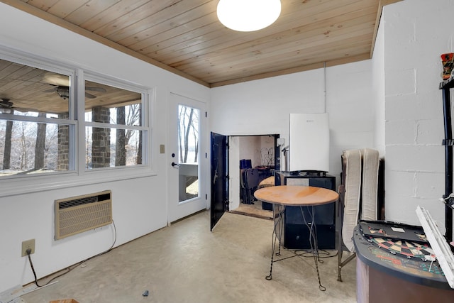 dining space with a wall mounted air conditioner, concrete floors, and wooden ceiling