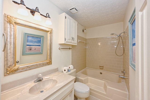 bathroom featuring vanity, visible vents, bathtub / shower combination, a textured ceiling, and toilet