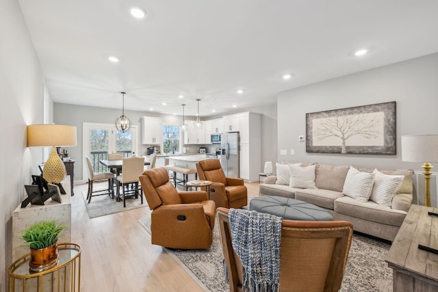 living room featuring recessed lighting and light wood-type flooring