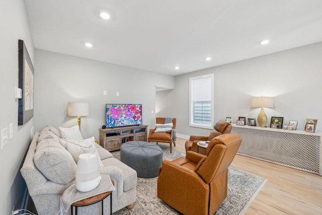 living room featuring recessed lighting and wood finished floors