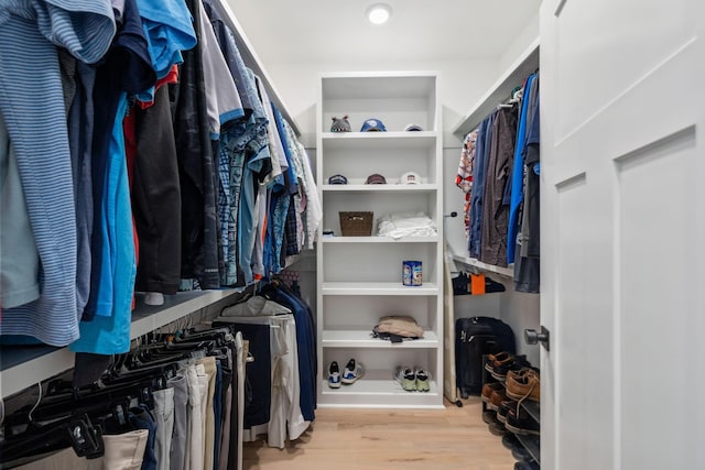 spacious closet with wood finished floors