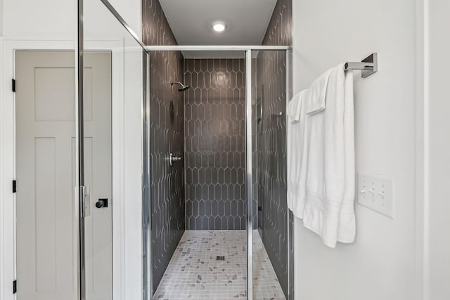 bathroom with a stall shower