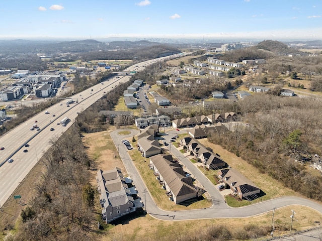 birds eye view of property with a residential view