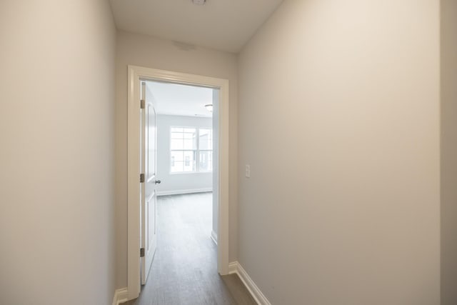 158 Oasis Dr, La Vergne, TN 37086 - corridor with baseboards and dark wood-style flooring