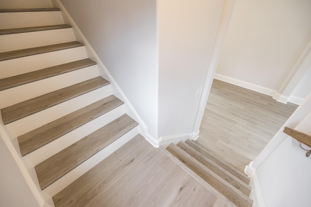 158 Oasis Dr, La Vergne, TN 37086 - stairs featuring baseboards and wood finished floors