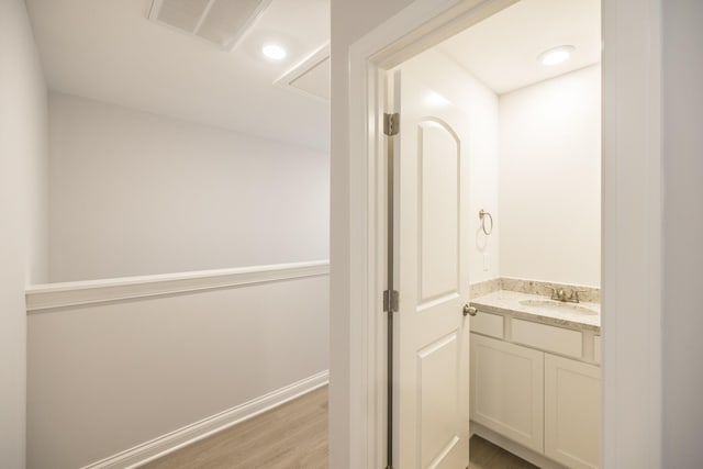 158 Oasis Dr, La Vergne, TN 37086 - bathroom with visible vents, wood finished floors, recessed lighting, baseboards, and vanity