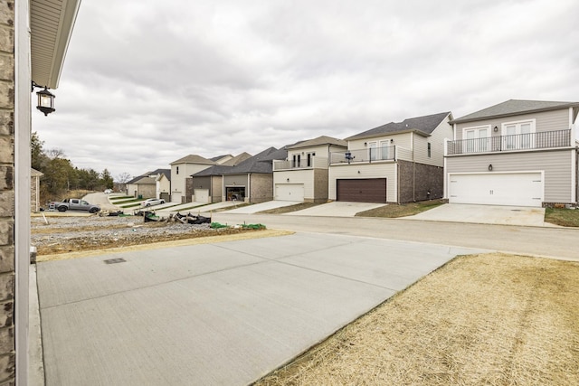 158 Oasis Dr, La Vergne, TN 37086 - view of yard with a garage, a residential view, a balcony, and driveway