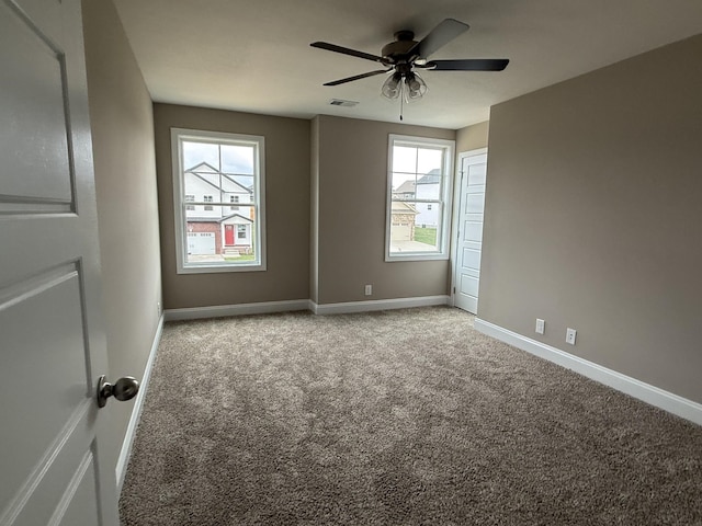 180 Cardinal Crk, Clarksville, TN 37040 - carpeted empty room featuring healthy amount of natural light, baseboards, and a ceiling fan