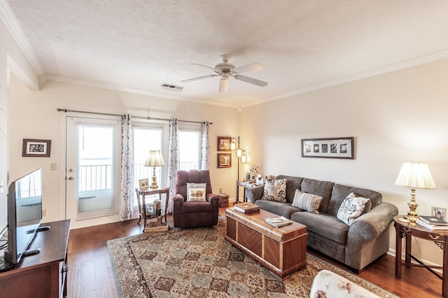 903 Churchill Xing, Madison, TN 37115 - living area with visible vents, ceiling fan, dark wood-type flooring, a textured ceiling, and crown molding