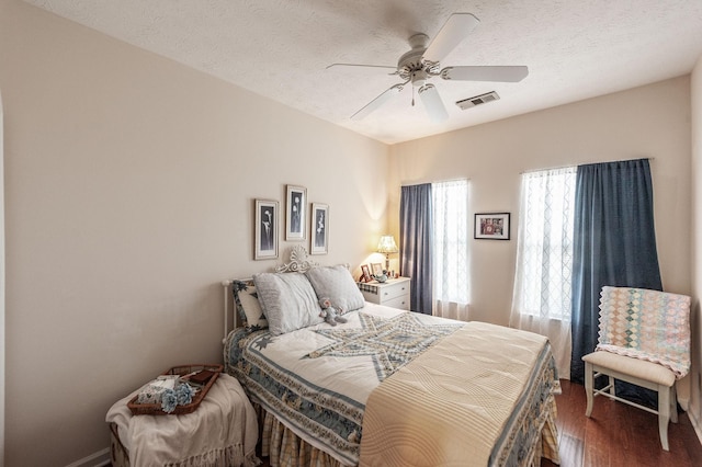 903 Churchill Xing, Madison, TN 37115 - bedroom featuring a ceiling fan, wood finished floors, visible vents, and a textured ceiling