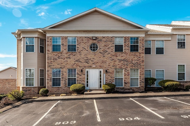 903 Churchill Xing, Madison, TN 37115 - view of property with brick siding and uncovered parking