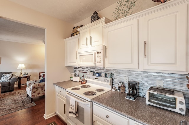 903 Churchill Xing, Madison, TN 37115 - kitchen featuring white appliances, a toaster, dark wood-type flooring, a textured ceiling, and white cabinetry